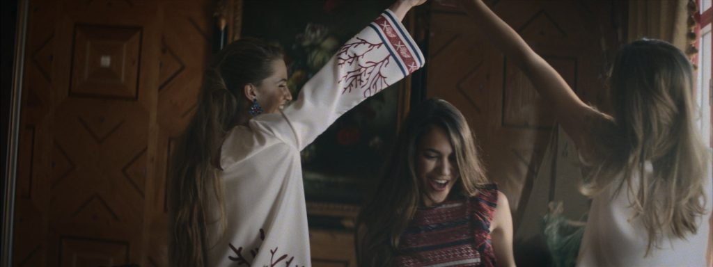 Sweet Matitos fashion film still: women dancing inside the house