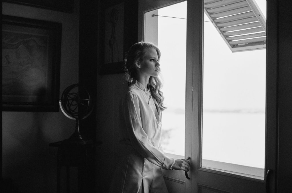 Daniela Canessa by a window, black and white